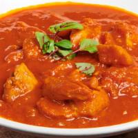 Chicken Vindaloo · Tender pieces of seasoned chicken simmered in a curry sauce with potatoes.