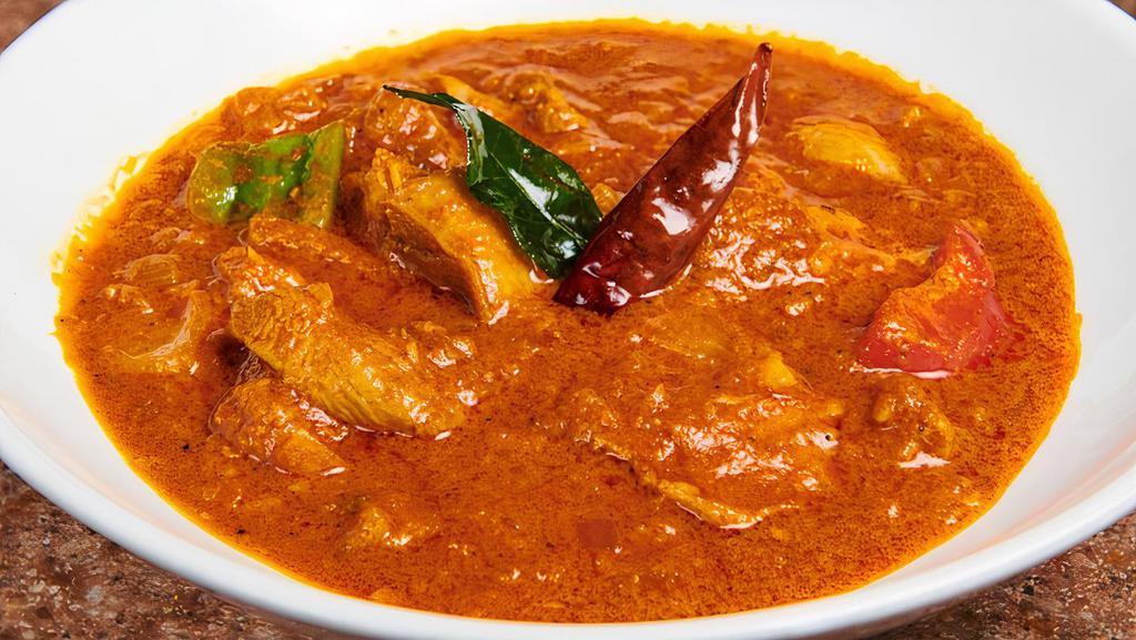 Chicken Kadai · Cubes of chicken cooked in whole Indian spices in onion and tomato gravy.