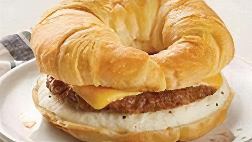 Sausage, Egg & Cheese Sandwich · A buttery croissant with sausage patty, two fried eggs and choice of cheese.
