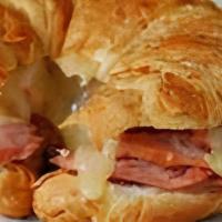 Ham, Egg & Cheese Sandwich · A buttery croissant with sliced ham, two fried eggs and choice of cheese.