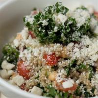 Kale & Quinoa Salad · Marinated kale, cherry tomatoes, chickpeas, cucumbers, feta, red onion, and greek dressing.