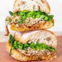Capicola Pork Sandwich · Garlic & pepper rubbed roast pork with melted provolone and broccoli rabe on grilled ciabatt...