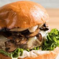 Fungi Fungi · Beef patty with sautéed mushrooms, cartelized onions, gruyere cheese, lettuce and a house-ma...