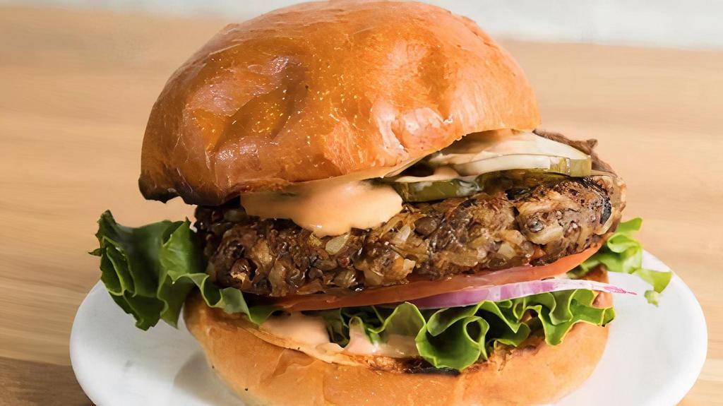 Veggie Burger · A lentil, quinoa, black bean and brown rice veggie patty, with lettuce, tomato, red onion, pickles and a house-made Stocked Sauce served on a grilled brioche bun. (Substitute a different bun option or patty below.)