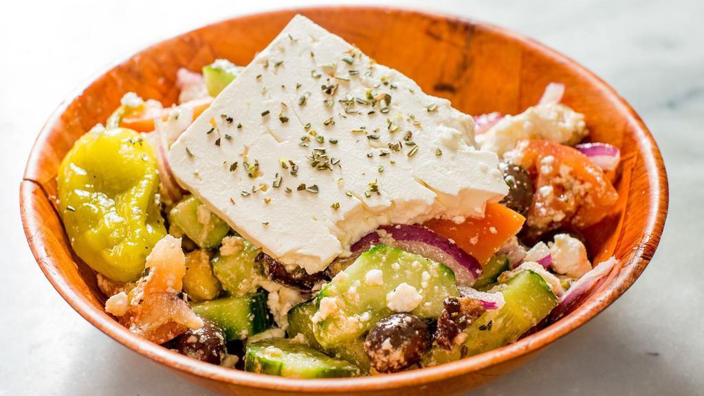 Greek Salad · Popular. Organic tomato, cucumber, red onion, kalamata olive, feta cheese, pepperoncini, and red wine vinaigrette.