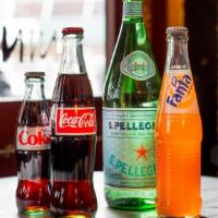 Soft Drinks · Choose from a variety of sodas and waters.