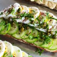 Hummus, Egg And Cucumber Toast · Toasted Country Bread, Joe-Joe’s Signature Classic Hummus, Egg, Cucumber, Capers, Parsley, S...