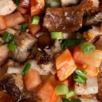 Lechon Special · Onions and tomatoes.