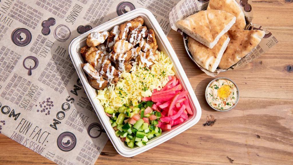 Chicken Kebob Plate · Plate comes with your choice of rice or couscous, Four Side Salads and a Side of Pita