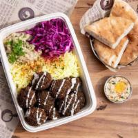Soom Soom Falafel Plate · Plate comes with your choice of rice or couscous, Four Side Salads and a Side of Pita