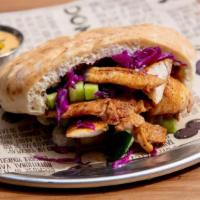 Chicken Breast · Build your Pita or Wrap, filled with your choice of four Salads and Spreads