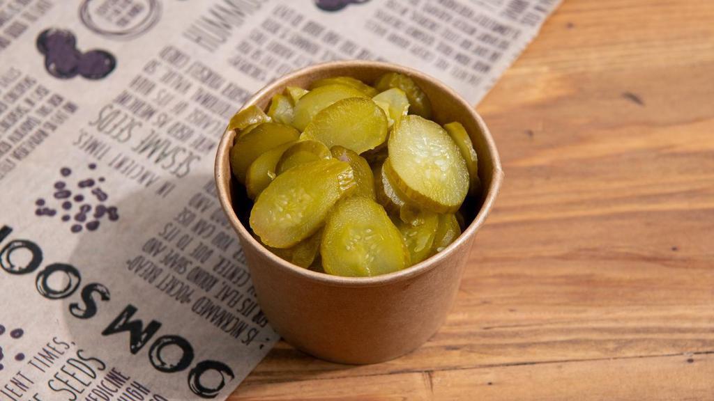 Israeli Pickles · Freshly Brined, Crisp, Full Sour, Sliced Pickles.