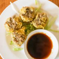 Thai Dumpling · 146158449 favorite: Minced pork, crispy, garlic, sweet ginger soy sauce and steamed or fried.