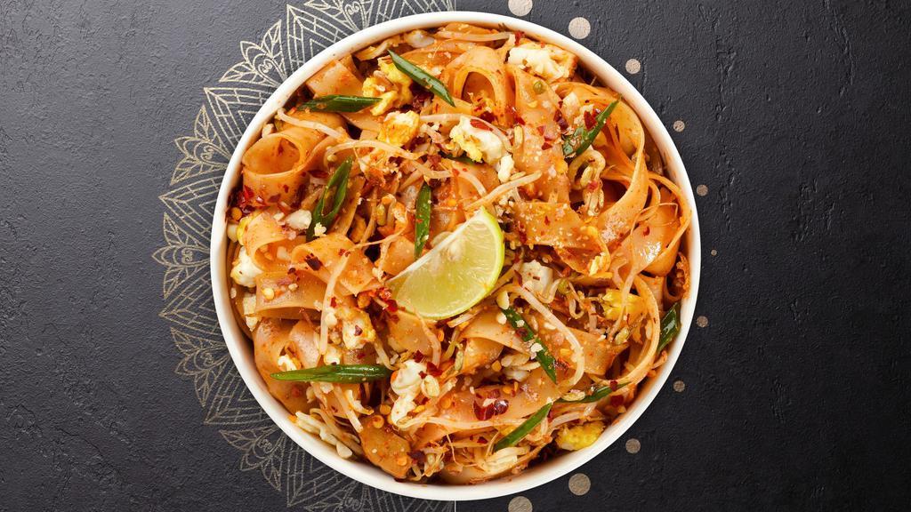 Pretty Pad Thai · (Spicy) Flat rice noodles sauteed in a light spicy sweet sauce, with browned tofu, bean sprouts, scallions, and crushed peanuts.