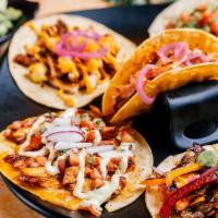 Solo · 1 starters and 3 tacos of your choice.