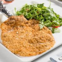 Cotoletta Alla Milanese · Pounded thin veal chop “Milanese style” with arugula, grape tomatoes, and lemon vinaigrette.