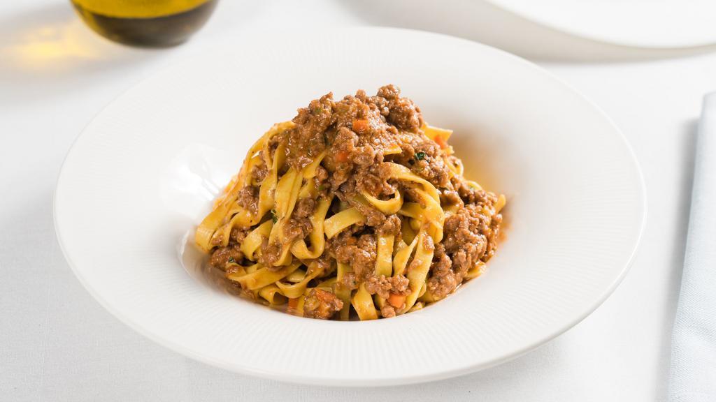 Spaghetti Alla Carbonara · Spaghetti with “guanciale” tossed in eggs and Pecorino cheese.
