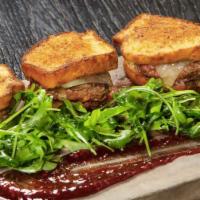 Jammin Sliders · Ground chuck, aged white cheddar, raspberry peppered jam, and charred jalapeno cornbread.