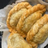 Chicken Curry Puff (4) · Puff pastry stuffed with minced chicken, potatoes and curry powder served with sweet cucumbe...