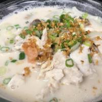 Tom Kha Soup · Coconut milk soup, onion mushroom and tomato.