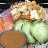 Thai Style Salad · Lettuce, tomato, shallot, bean sprout and fried tofu with side of peanut dressing. * 
 
*100...