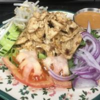 Grilled Chicken Salad · Marinated grilled chicken, lettuce, tomato, shallot and bean sprout with side of peanut dres...