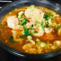 Tom Yum Noodle Soup · Hot and sour shrimp broth with mushroom, Chinese broccoli and bean sprouts. * 
 
*Medium Spicy