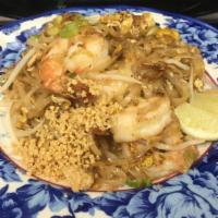 Pad Thai Tom Yum · Rice noodle, bean prouts, scallion, peanuts. Tom yum paste and egg. * 
 
*Medium Spicy