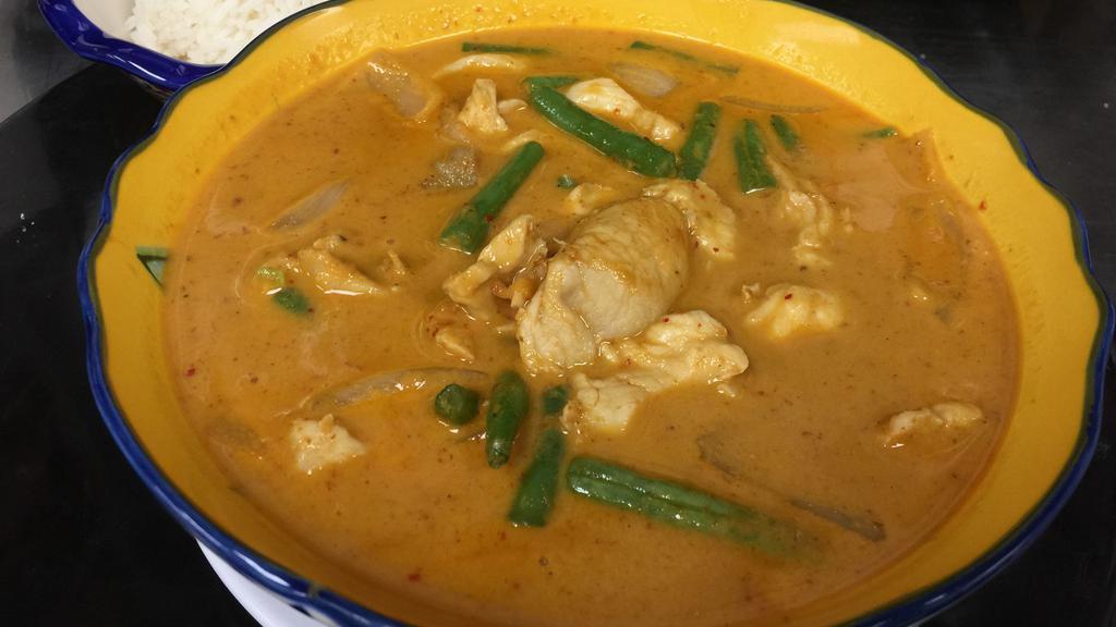 Panang Curry · Coconut milk, bell pepper and string bean. * 
 
*100% Vegan Friendly, Medium Spicy