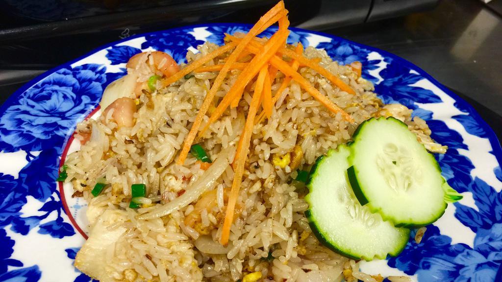Thai Fried Rice · Fried rice with carrot, onion, tomato, scallion and egg.