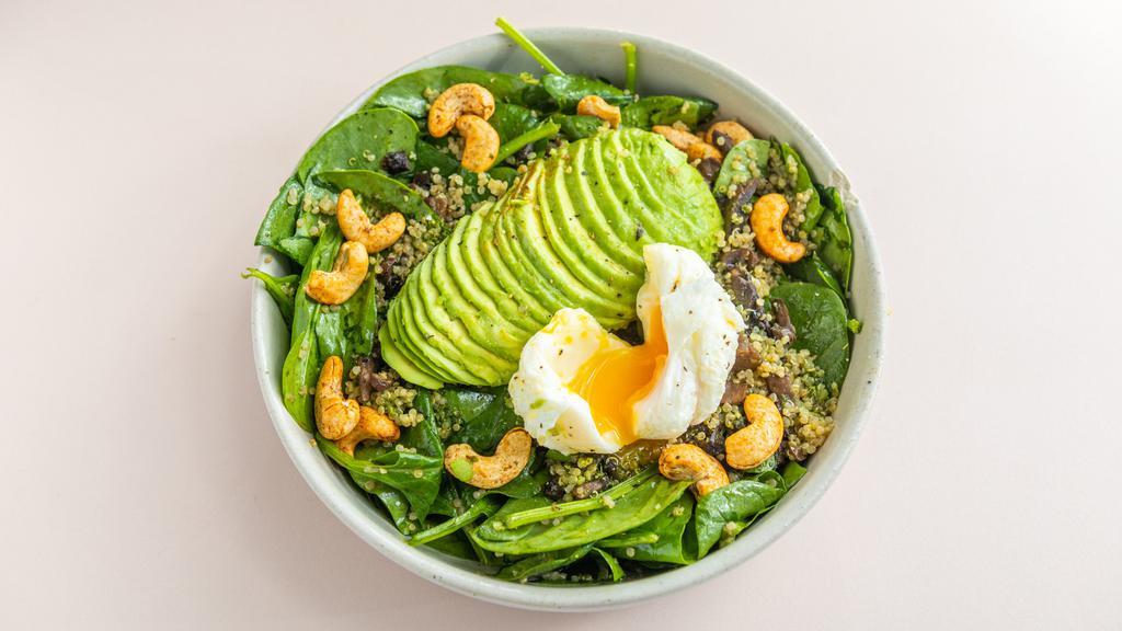 Healthy Bowl Salad · Quinoa, spinach, poached egg, lemon vinaigrette, spicy cashews, portobello mushrooms, avocado, kale pesto.