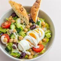 Israeli Breakfast Salad · Chickpeas, tomatoes, cucumbers, olives, scallions, hard boiled egg, romaine, lemon vinaigret...
