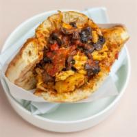 Big Grill Breakfast Pita · Roasted potato, portobello mushroom, tomato sauce and scrambled egg pita sandwich.