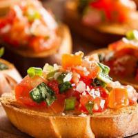 Bruschetta · Toasted bread, tomato, red onion, balsamic, and olive oil.