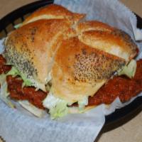 Bleu Cheese Chicken Sandwich · Fried Chicken with Bleu Cheese Dressing, Hot Buffalo Sauce, lettuce, tomatoes, & onions on a...