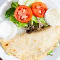 Quesadilla · Choice of chicken, beef, or cheese. Inside cheese, lettuce, cilantro, and cooked onion, on t...