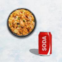Chicken Biryani & Soda · Long grain basmati rice cooked with tender chicken and aromatic Indian herbs. Served with yo...