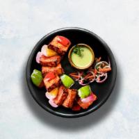 Paneer Tikka · Cubes of cottage cheese marinated in yogurt and glazed in a traditional Indian clay oven. Se...