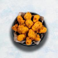 Paneer Pakora · Perfectly fried crisp cottage cheese fritters. Served with our signature mint relish.