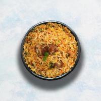 Lamb Biryani · Long grain basmati rice cooked with tender lamb and aromatic Indian herbs.