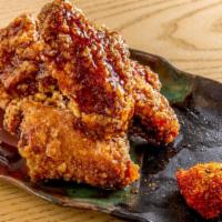 Tebasaki Buffalo Chicken Tapas · Fried chicken wing with house made spicy sauce.