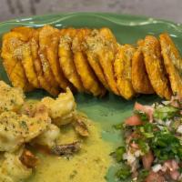 Camarones Al Ajillo (Shrimp On Garlic Sauce) · Shrimp or garlic sauce, with your choice of tostones, French fries, or sweet potatoes fries.