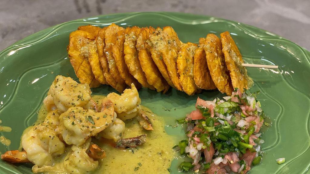 Camarones Al Ajillo (Shrimp On Garlic Sauce) · Shrimp or garlic sauce, with your choice of tostones, French fries, or sweet potatoes fries.