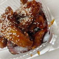 Sesame Chicken Wings* · Fried fresh, delicious crispy chicken wings sauteed in our sweet house gooey sesame chicken ...