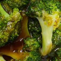 Sauteed Broccoli · In brown sauce, with white rice.