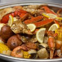 King Seafood Feast · 2 lbs snow crab legs, 2 lobster tails, 2 lbs shrimp, 1 lb clams, 1 lb green mussels, 1 lb sa...