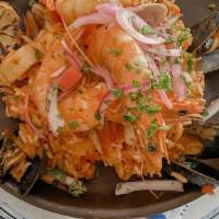 Peruvian Paella De Mariscos · Shellfish. White shrimp, mussels, octopus, scallions, calamari, little neck clams chorizo, s...