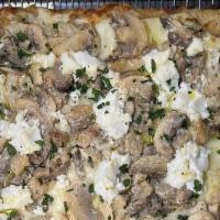 Truffle Funghi · imported urbani truffle cream, cremini mushrooms, creamy ricotta, italian shredded mozzarell...