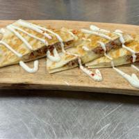 Smash'D Quesadilla · Selection of chicken, beef, or cheese with peppers, tomatoes & cheese. Topped with sour crea...