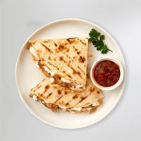 Quesadillas · Cheese wrapped in a grilled tortilla.
